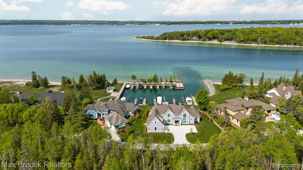 7615 Oyster Bay Drive, Charlevoix, MI 49720 — front exterior