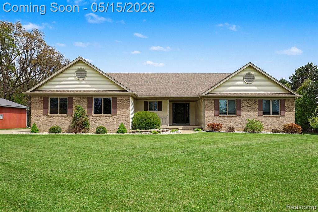 7700 N Dewitt Road, MI 48879 — front exterior