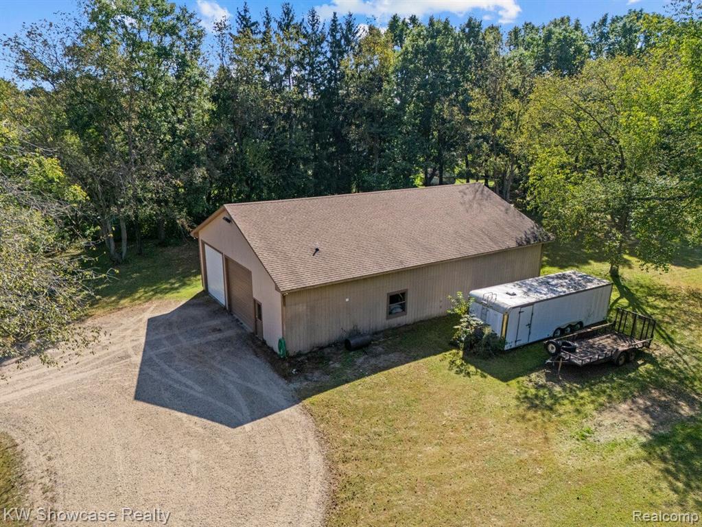 766 WHITE HOUSE Drive, Highland, MI 48356 — Photo 69