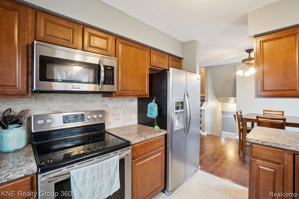 830 TANAGER Trail, Howell, MI 48843 — Photo 13