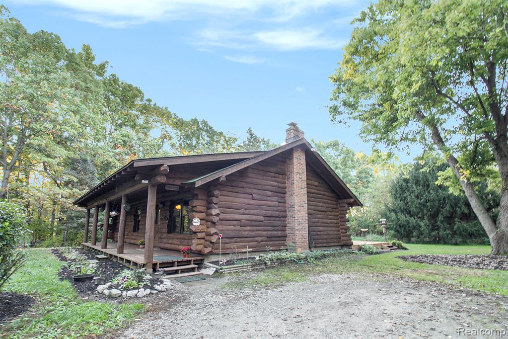 4166 Sweet Road, Howell, MI 48843 — front exterior