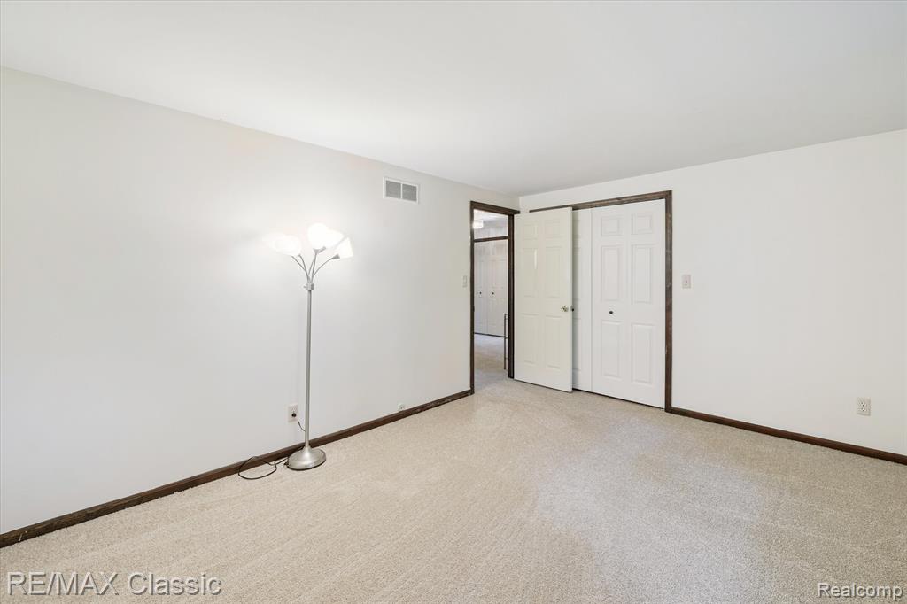 1561 Waters Edge Court, Wixom, MI 48393 — Photo 25