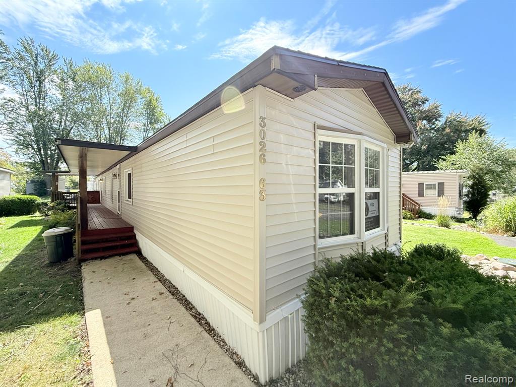 3026 Village Lane, Lot #63, Brooklyn, MI 49230 — front exterior