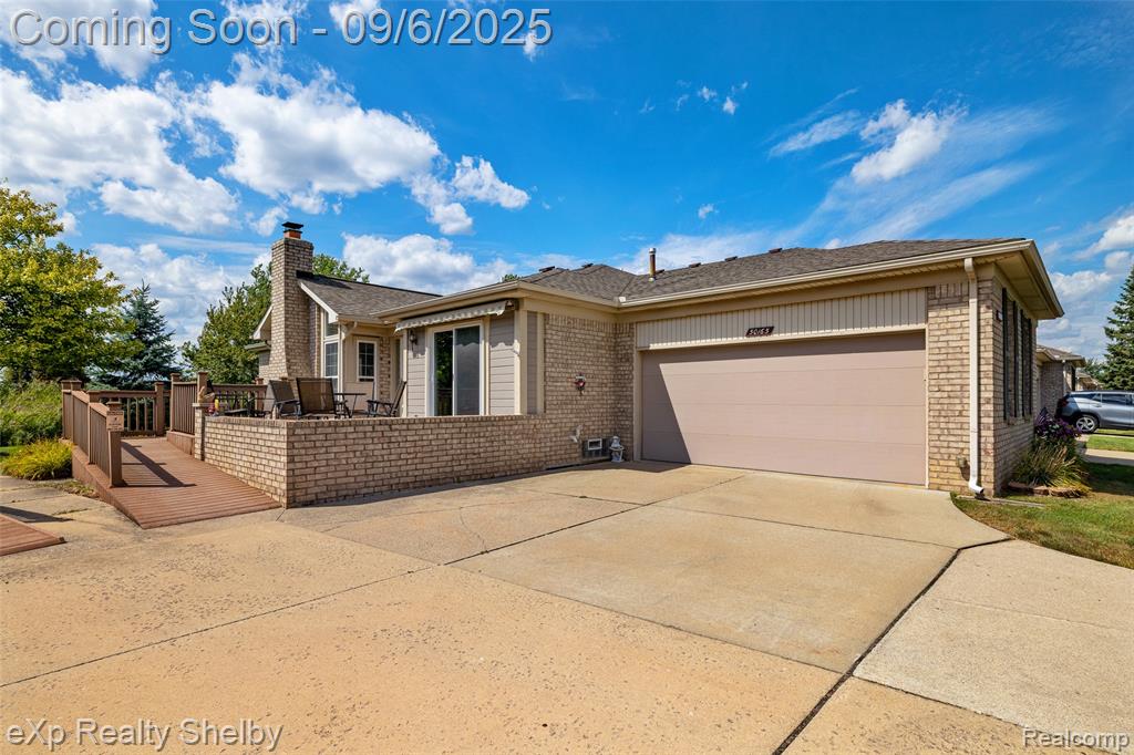 50165 Pepper Tree Drive, 52, Macomb, MI 48044 — front exterior
