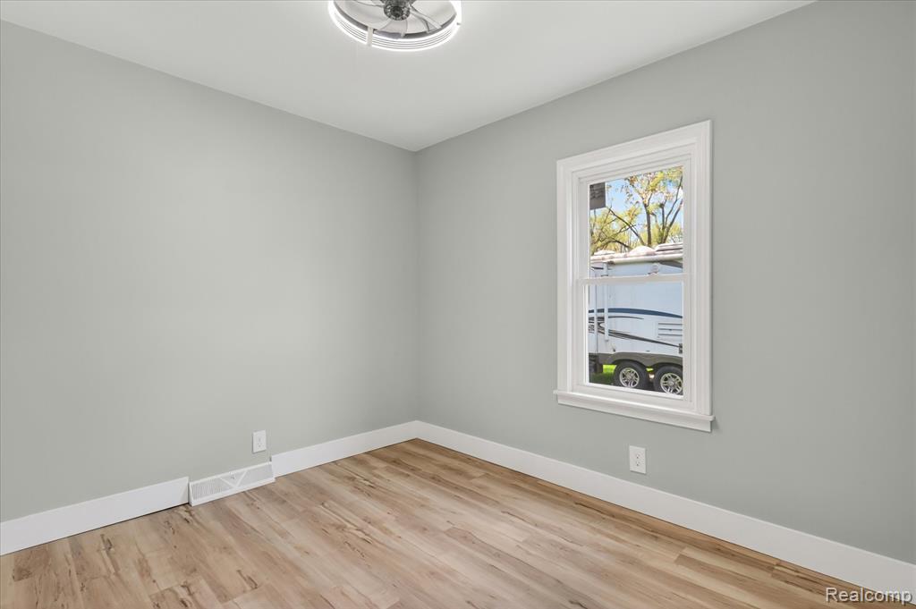 677 Lucille Drive, Wolverine Lake, MI 48390 — Photo 27