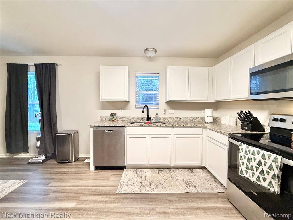 6079 Regency Drive, Burton, MI 48519 — Photo 14