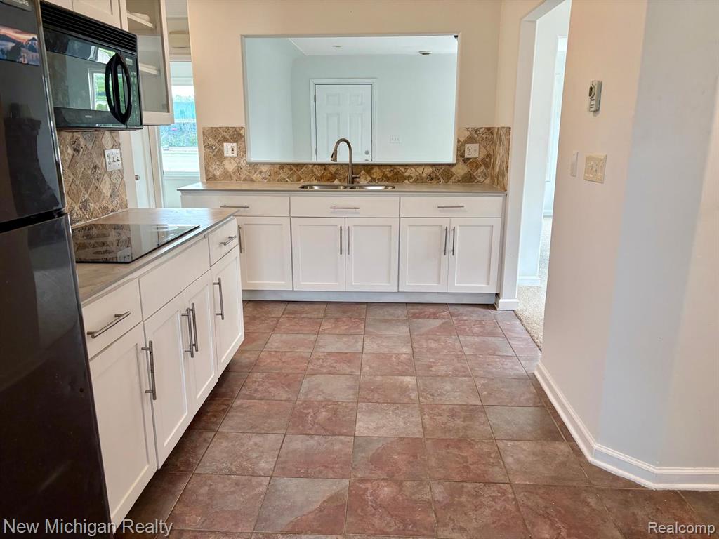 4469 S Saginaw Street, Burton, MI 48529 — Photo 17