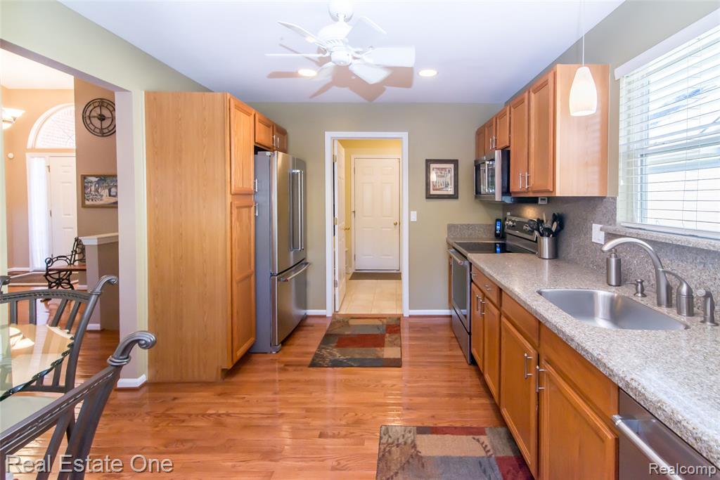 568 Woodhaven Drive, Walled Lake, MI 48390 — Photo 24