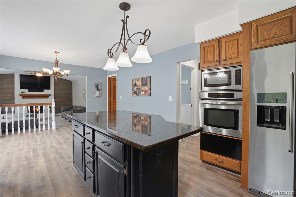 8876 Wintercove Drive, Commerce Twp, MI 48382 — Photo 28
