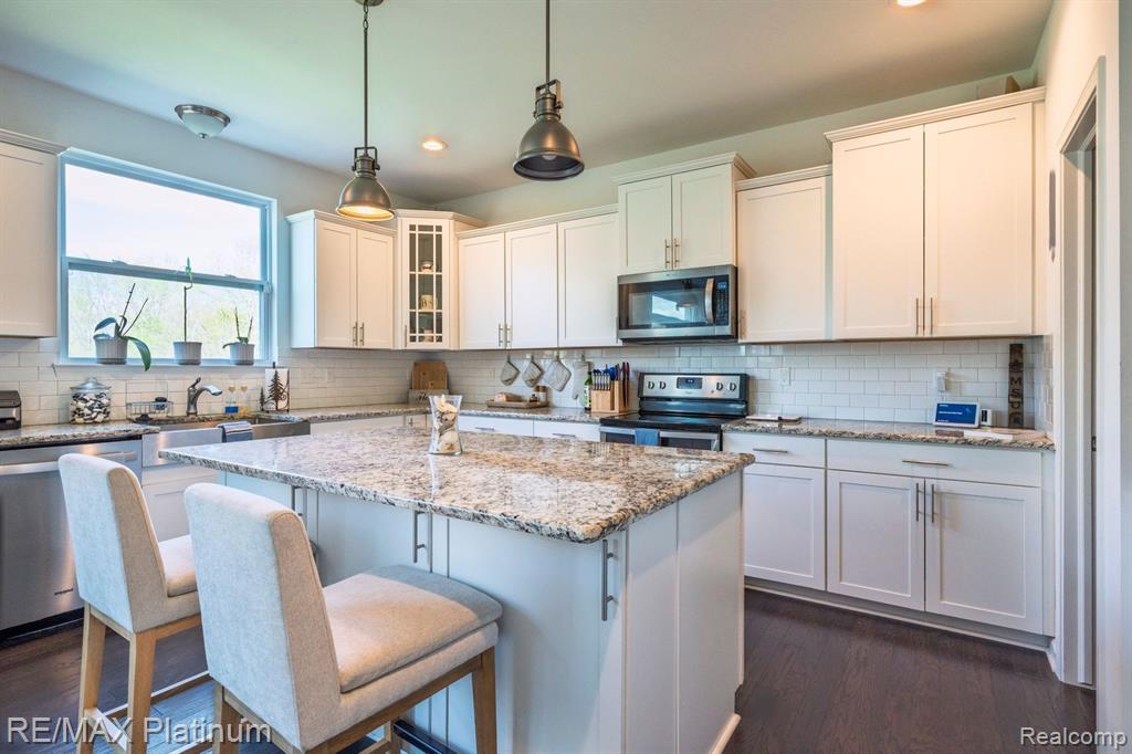 1402 SECRETARIAT Way, Howell, MI 48843 — Photo 11