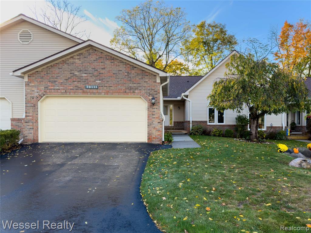 70111 Whitetail Lane, 6, Bruce, MI 48065 — front exterior