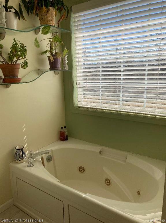 1451 ASHLYN Court, Fowlerville, MI 48836 — Photo 41