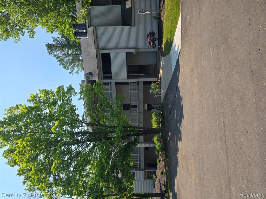 5714 Creeks Crossing, Williamsburg, MI 49690 — front exterior