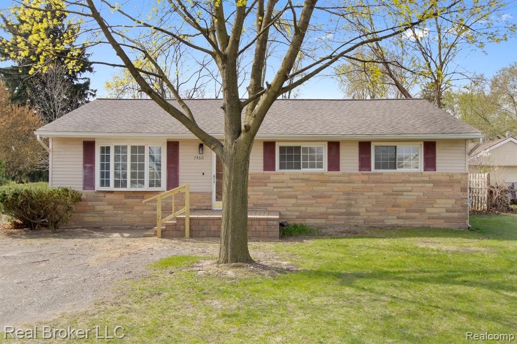 7460 22 MILE Road, Shelby Twp, MI 48317 — front exterior