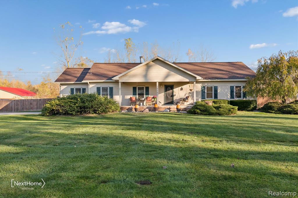 7010 Oakville Waltz Road, Sumpter, MI 48117 — front exterior