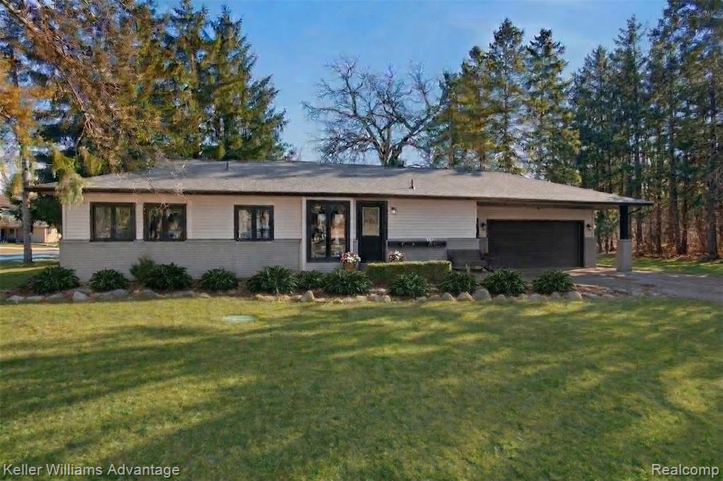 1210 Craven Drive, Highland, MI 48356 — front exterior