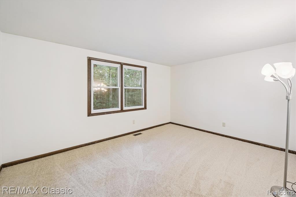 1561 Waters Edge Court, Wixom, MI 48393 — Photo 24