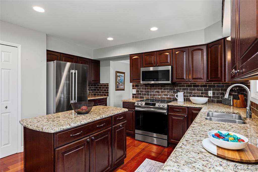 1874 Rothbury Drive, Wixom, MI 48393 — Photo 18