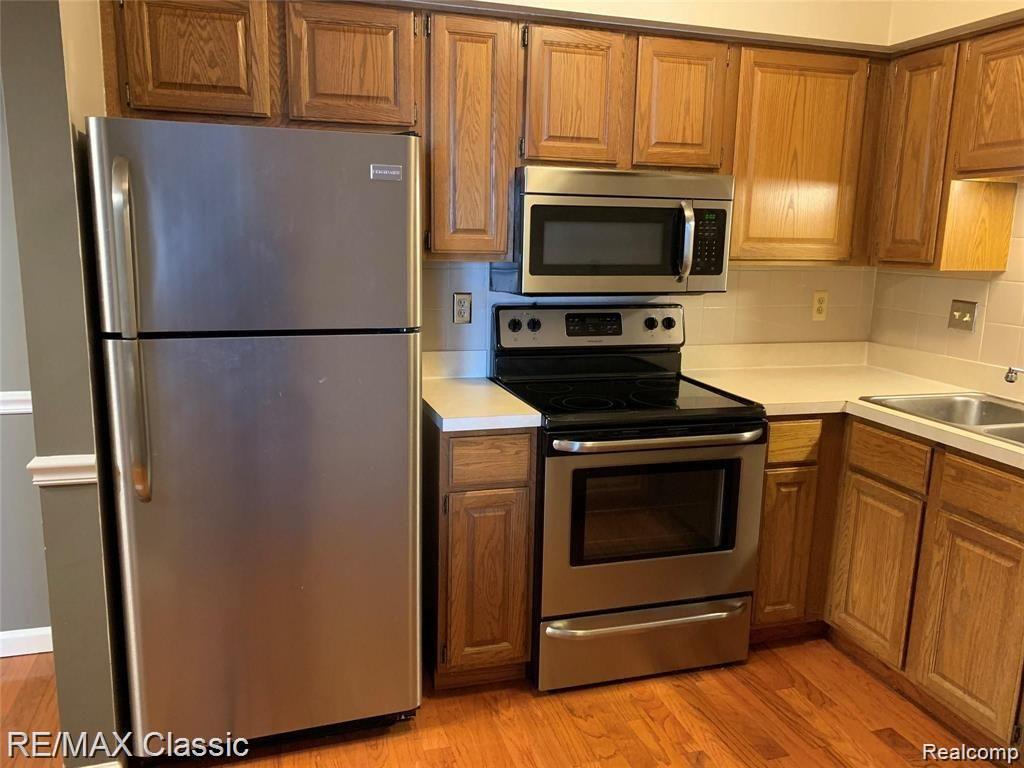 254 PINEWOOD Drive, 67, Plymouth, MI 48170 — Photo 6