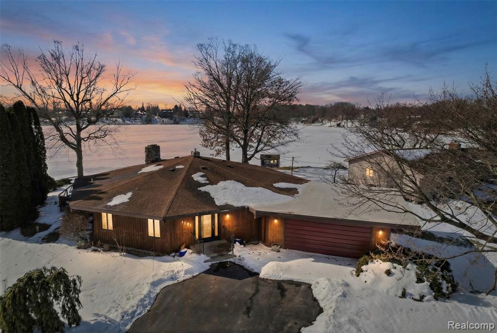 9136 Shinanguag Drive, Goodrich Vlg, MI — front exterior