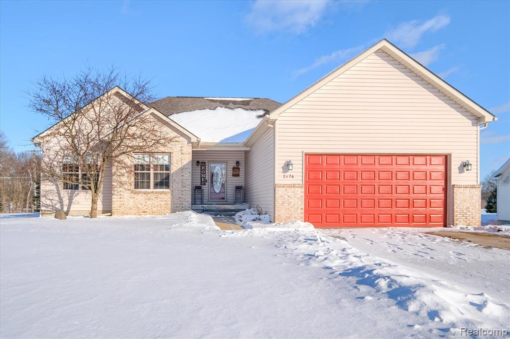2474 Lonesome Dove Trail, Lapeer, MI 48446 — front exterior