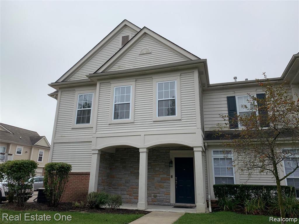 7211 Addington Drive, Commerce Twp, MI 48390 — front exterior