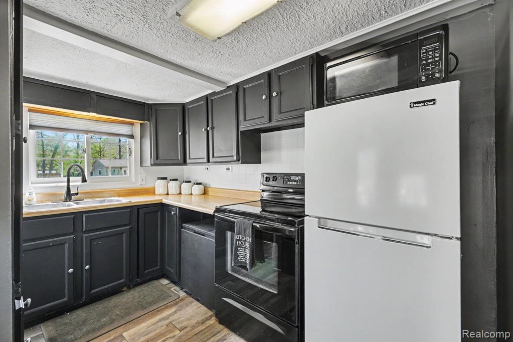4725 Hickory Drive, Highland, MI 48356 — Photo 10
