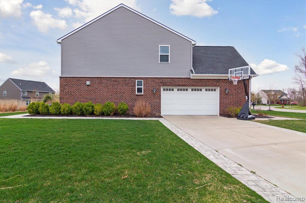 571 HUDSON Circle, South Lyon, MI 48178 — Photo 51
