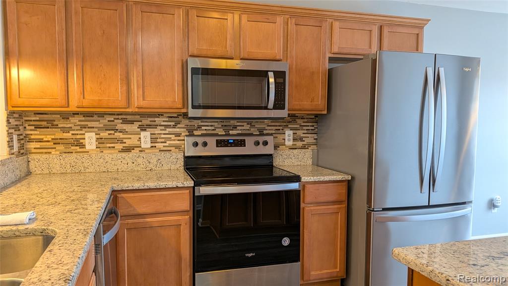 413 VILLAGE Drive, Walled Lake, MI 48390 — Photo 12