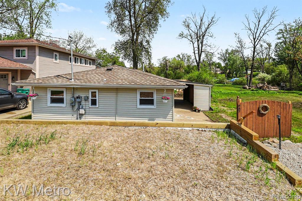 657 Dunleavy Drive, Highland, MI 48356 — Photo 22