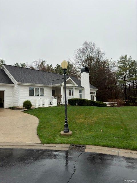 105 QUIET CREEK Circle, Chelsea, MI 48118 — Photo 32