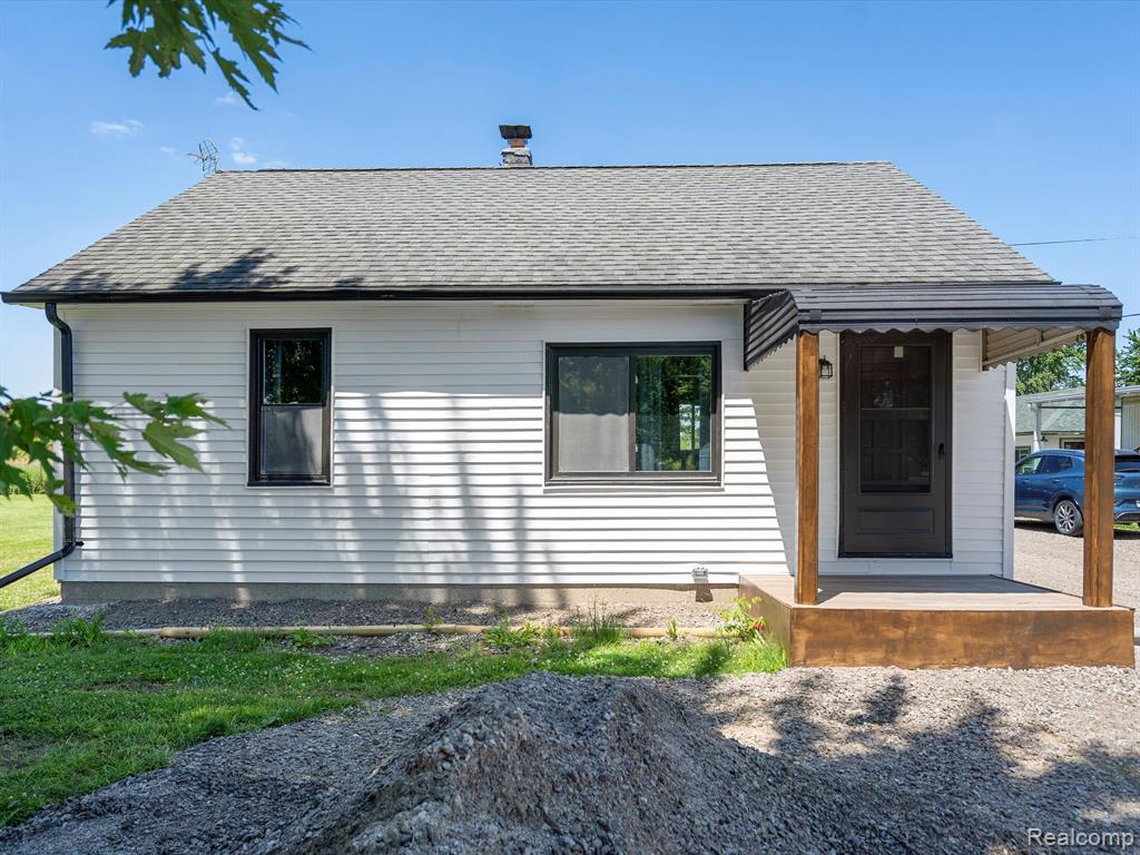 7784 RIVER Road, Cottrellville, MI — front exterior