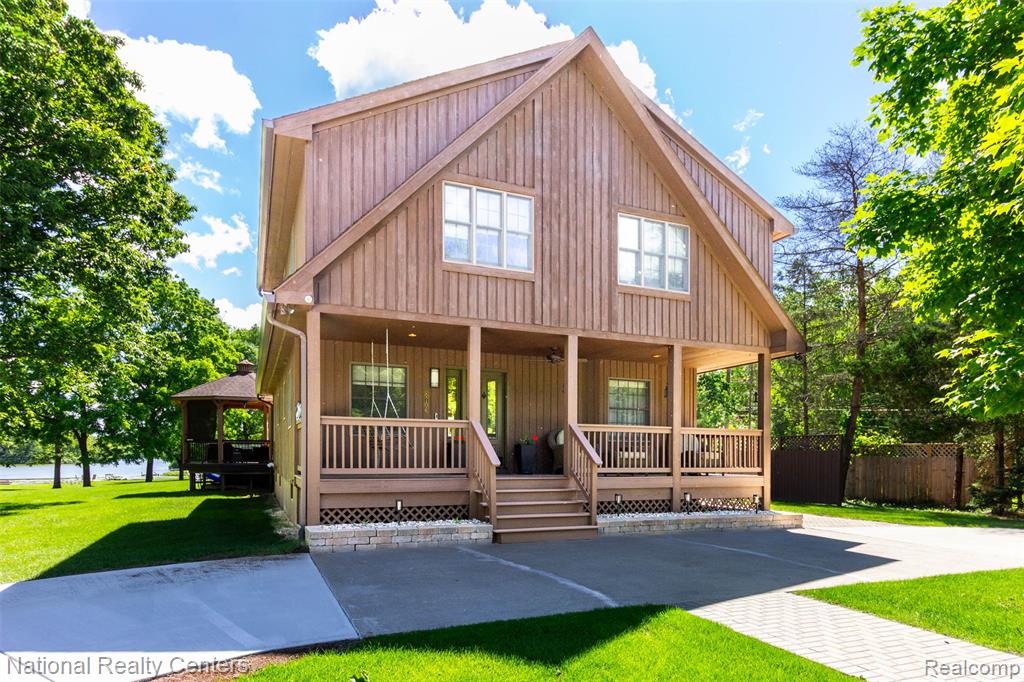 8706 Buckland Drive, South Lyon, MI 48178 — front exterior