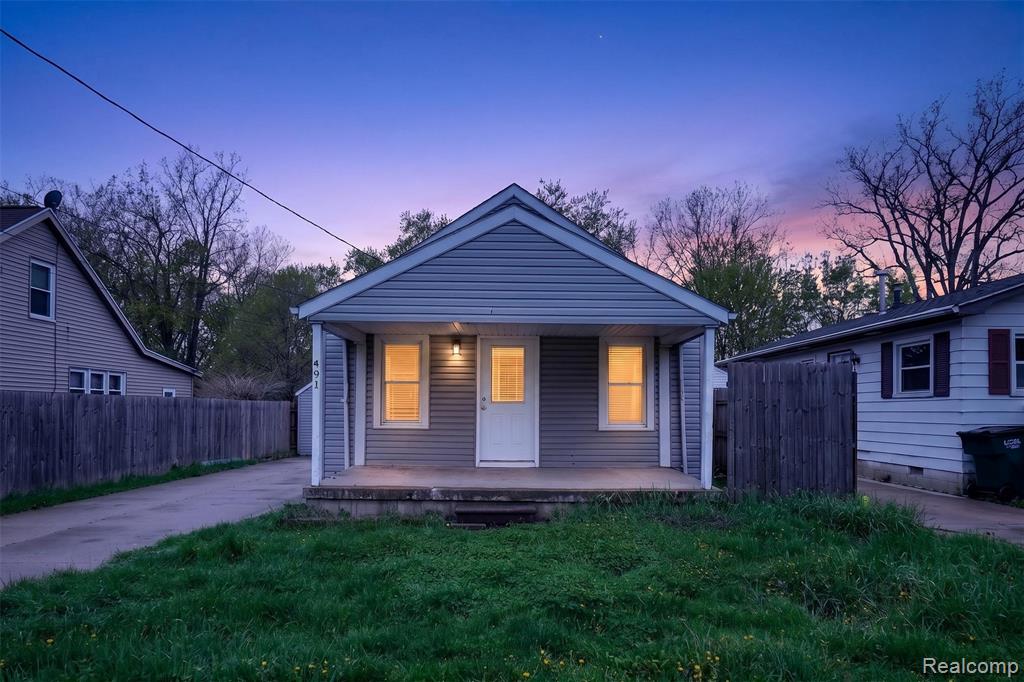 4910 HUGHES Road, Lansing, MI 48910 — front exterior