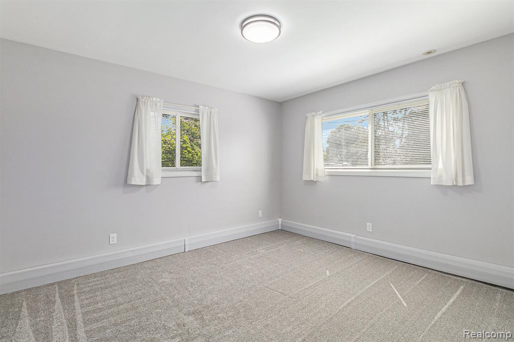 2145 Helmsford Drive, Wolverine Lake, MI 48390 — Photo 31