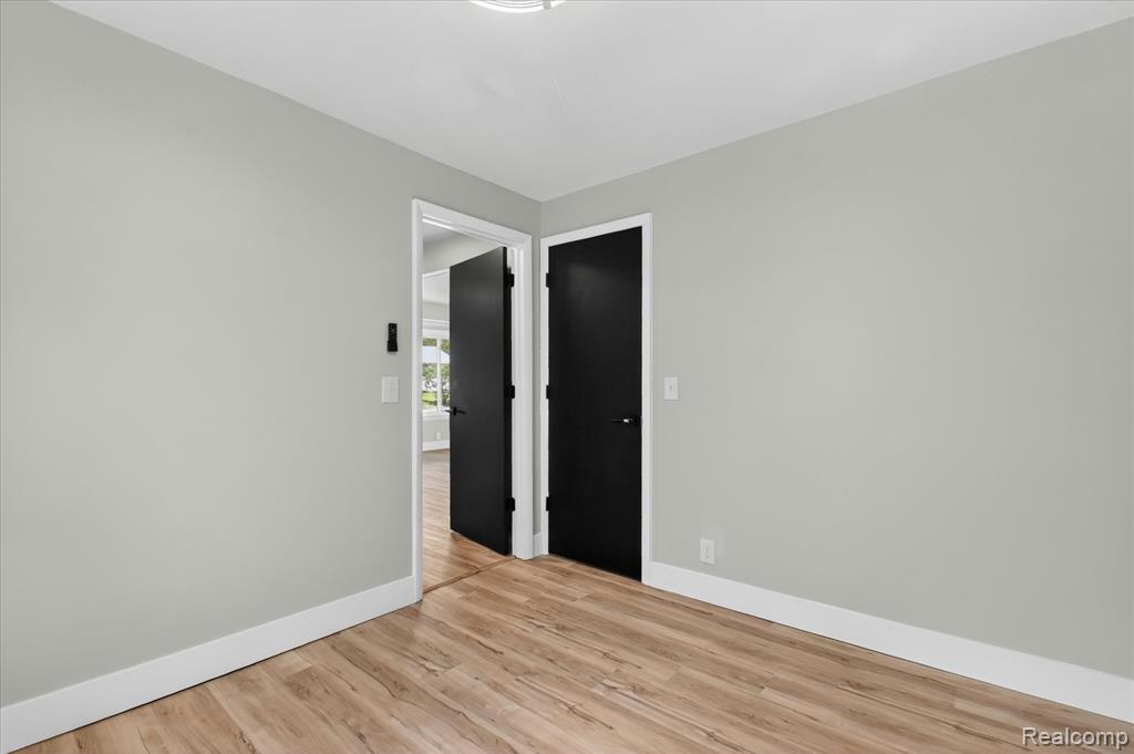 677 Lucille Drive, Wolverine Lake, MI 48390 — Photo 29