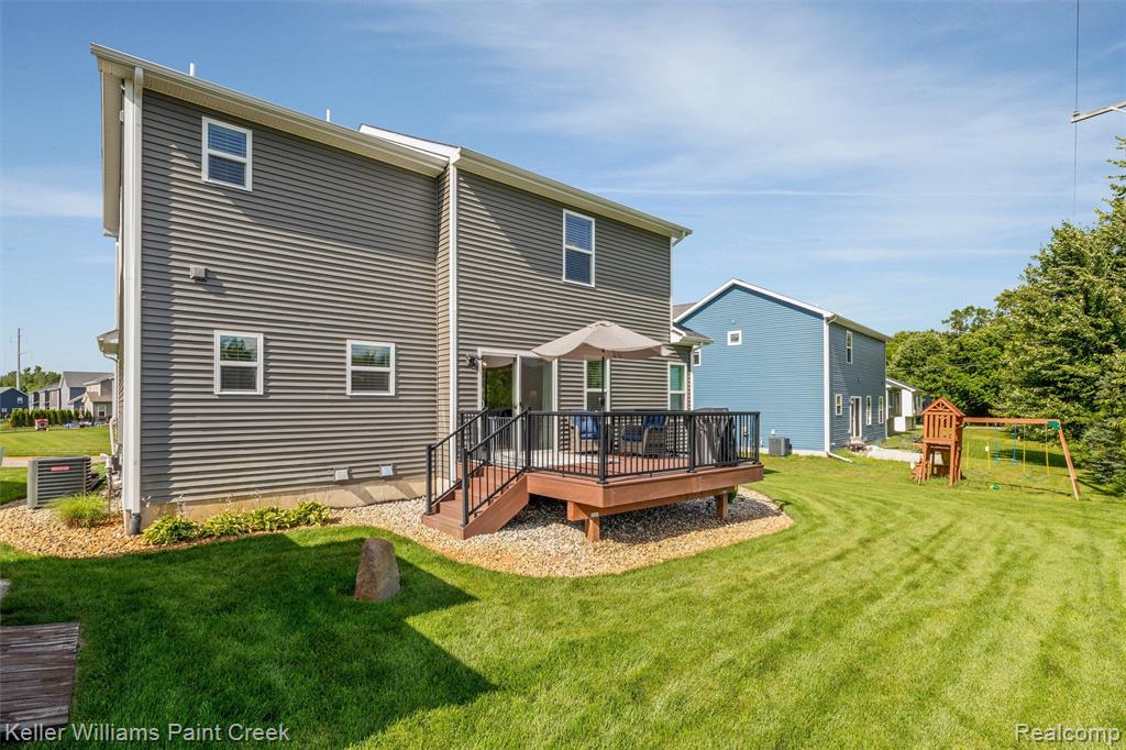 6097 Summerbrooke Circle, Fowlerville, MI 48836 — Photo 32