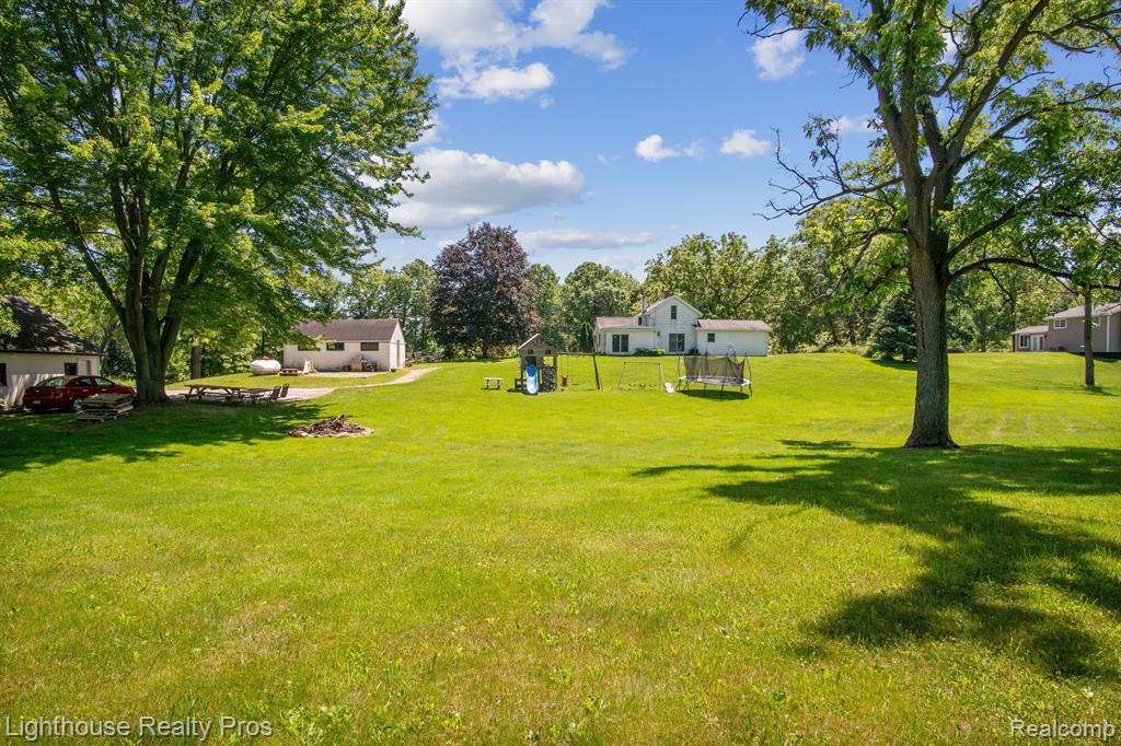 67640 W 8 MILE Road, South Lyon, MI 48178 — Photo 37