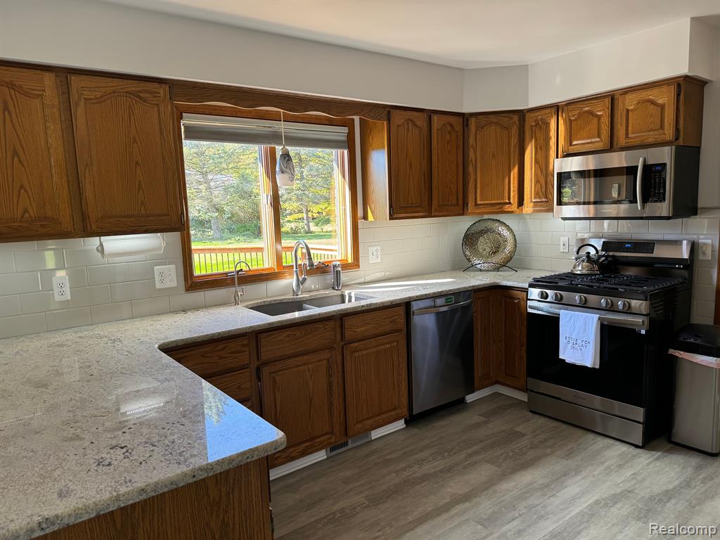 2606 PIGEON FORGE Drive, Brighton, MI 48114 — Photo 9