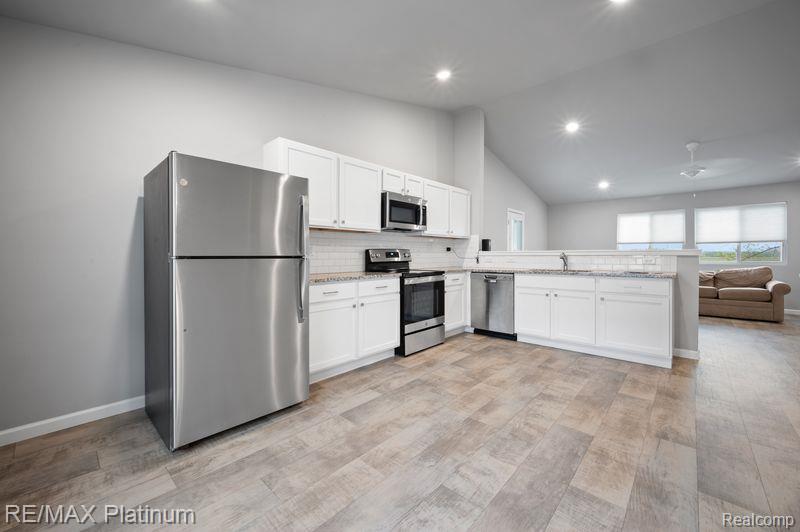 2869 W Sycamore River Drive, Fowlerville, MI 48836 — Photo 4