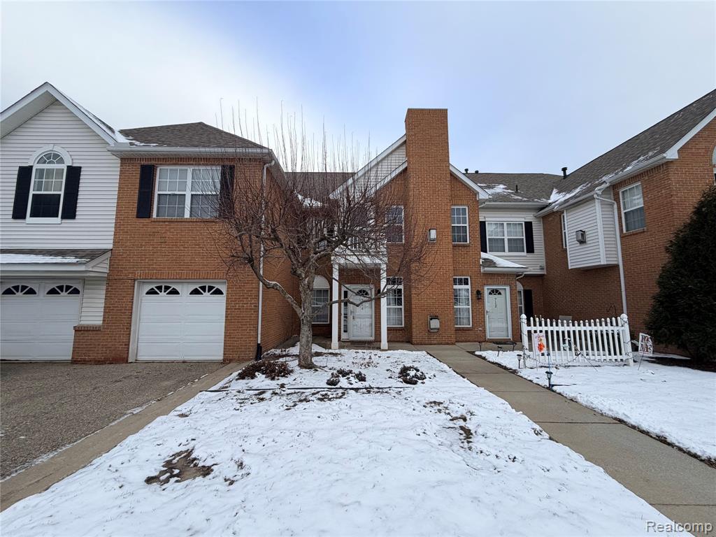 714 OLDE ENGLISH Circle, Unit 30, Howell, MI 48855 — front exterior
