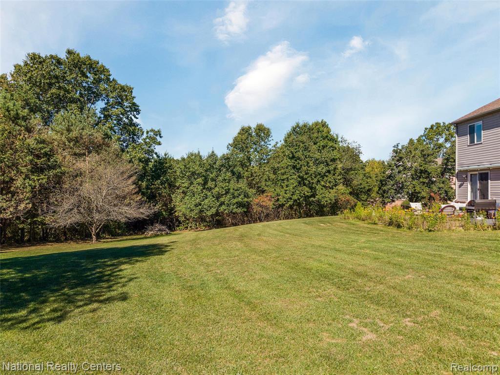 678 Joshua Drive, Highland, MI 48356 — Photo 39