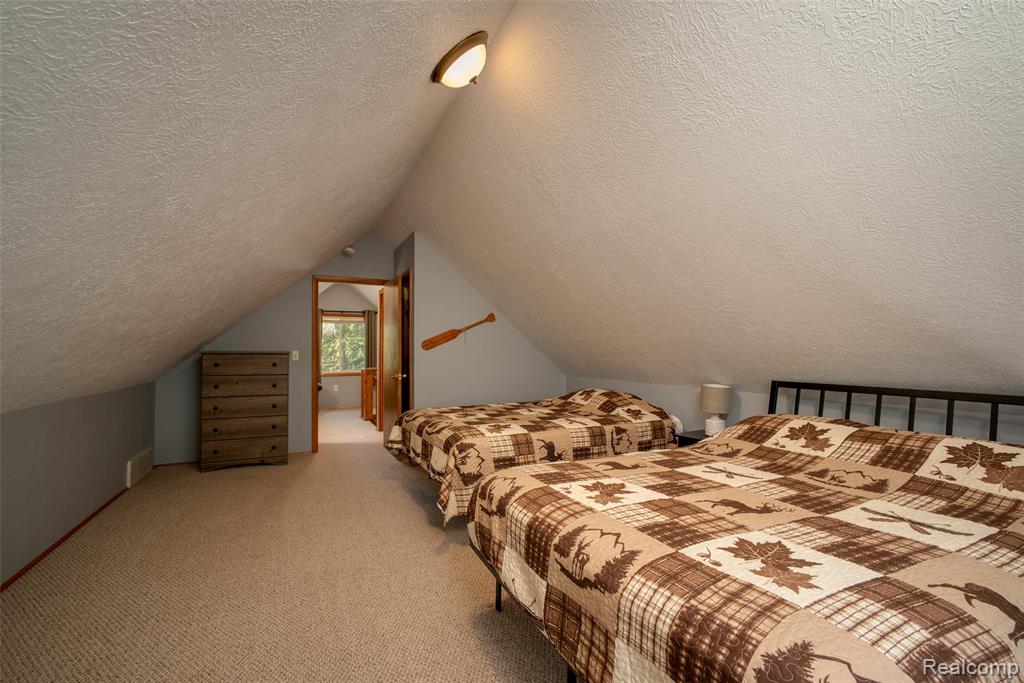 6954 AARWOOD Trail NW, Rapid City, MI 49676 — Photo 35
