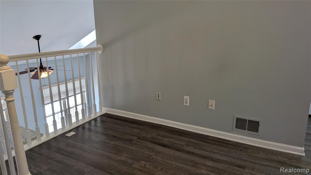 413 VILLAGE Drive, Walled Lake, MI 48390 — Photo 24