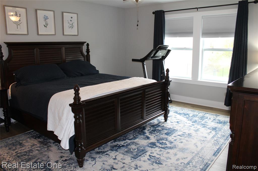 8662 Pinnebog River Drive, Fowlerville, MI 48836 — Photo 12