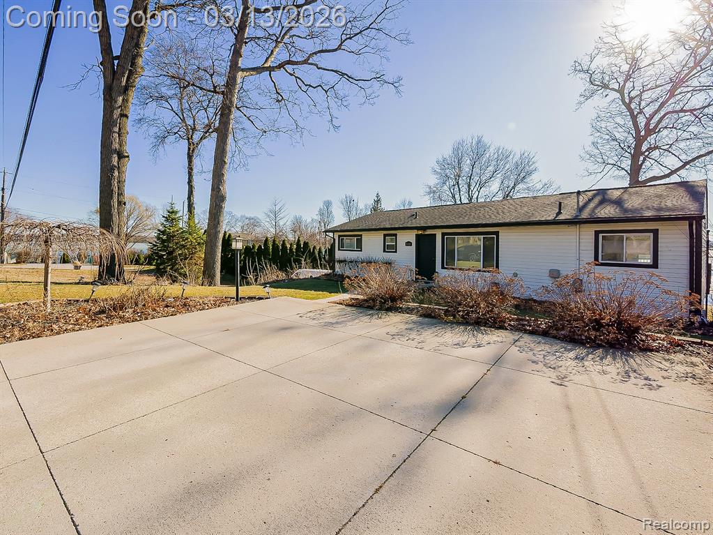 View of front of home with a lawn
