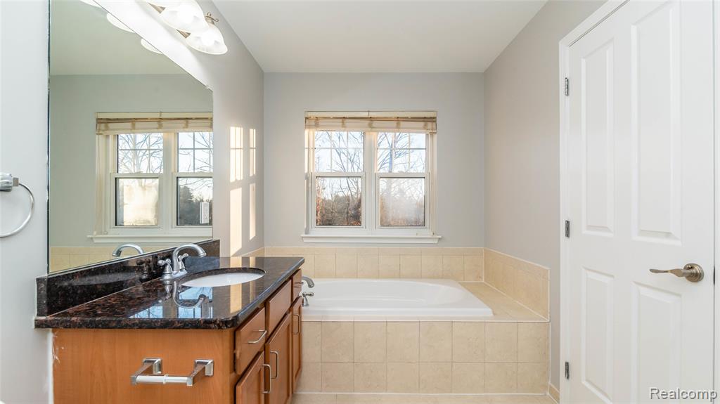 6114 Heron Hills Drive, Wolverine Lake, MI 48390 — Photo 28