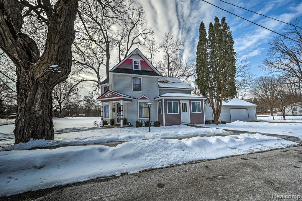 602 S BROAD Street, Holly, MI 48442 — front exterior
