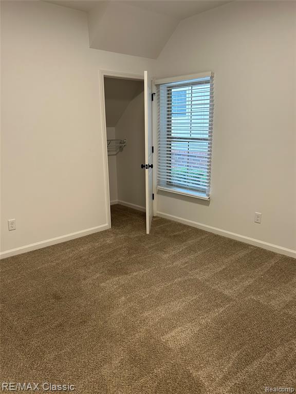 612 Pointe Drive, Walled Lake, MI 48390 — Photo 16
