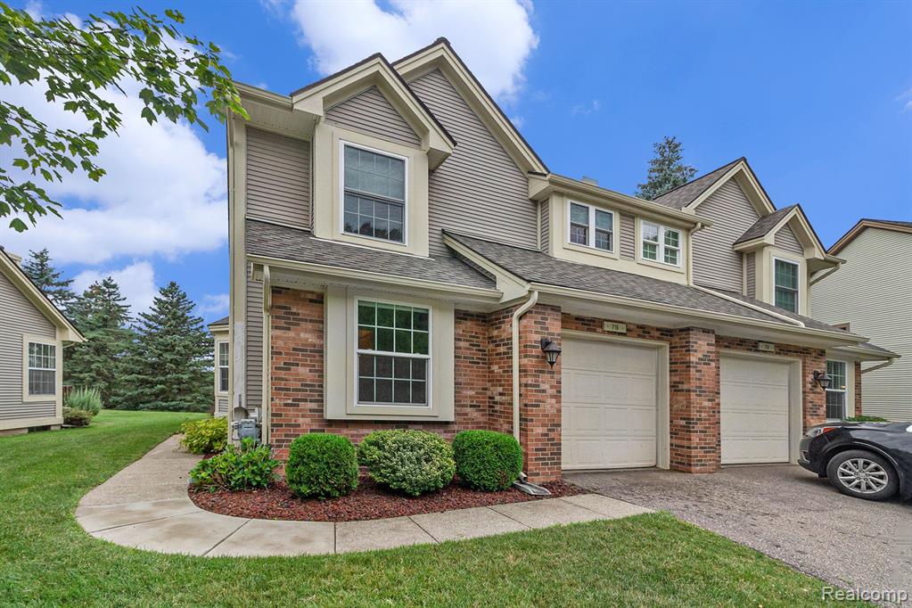 715 WHISPERWOOD Trail, Fenton, MI 48430 — front exterior